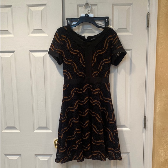 Black Peplum Ruffled Mini Dress - Picture 1 of 2